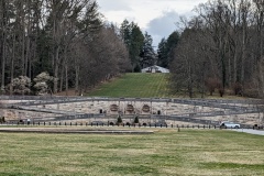 Structure and hill opposite the residence