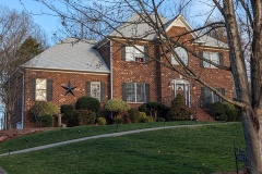 Full front view of house - see the face in the second story window?