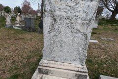 My great-grandparents' headstone, no longer readable. Initials on each side helped.