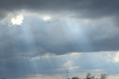 Sun beaming through the clouds