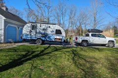 My truck and trailer at their house