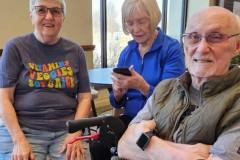Pam (left) and Bob (right) Hatch with volunteer at Feed the Starving Children Charity