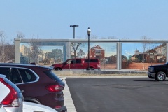 Variety of murals on the floodwall, historical to present