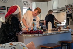 Vicki, Casey, and Kelley preparing breakfast