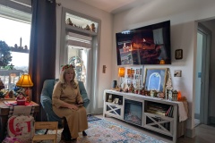 Vicki in her apartment, getting ready for the big Christmas gathering