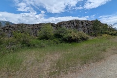 A much larger rock formation