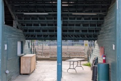 Entrance to corral, going under the bleacher seats