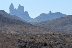 Mule Ears rock formation in the distance