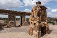 Dorgan house with petrified wood fireplace in the center of the house (photo from BBNP)