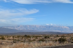 The mountain range in the distance has layers from when this was under water millions of years ago