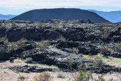 Another volcanic cinder cone with lava flow in front